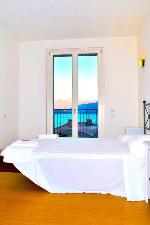 Apartamento Luxury Penthouse With Big Terrace Argegno Exterior foto